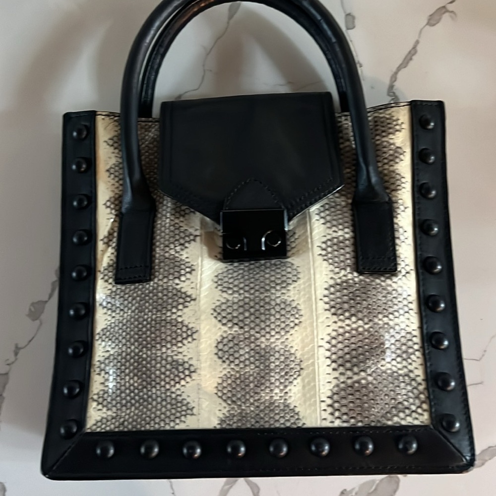 Elegant “New” Black and Cream Leather Handbag from Saks 5th Ave.